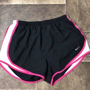 Pink and black nike shorts